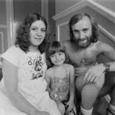 Childhood photo of Joely Collins along with her biological parents. 
